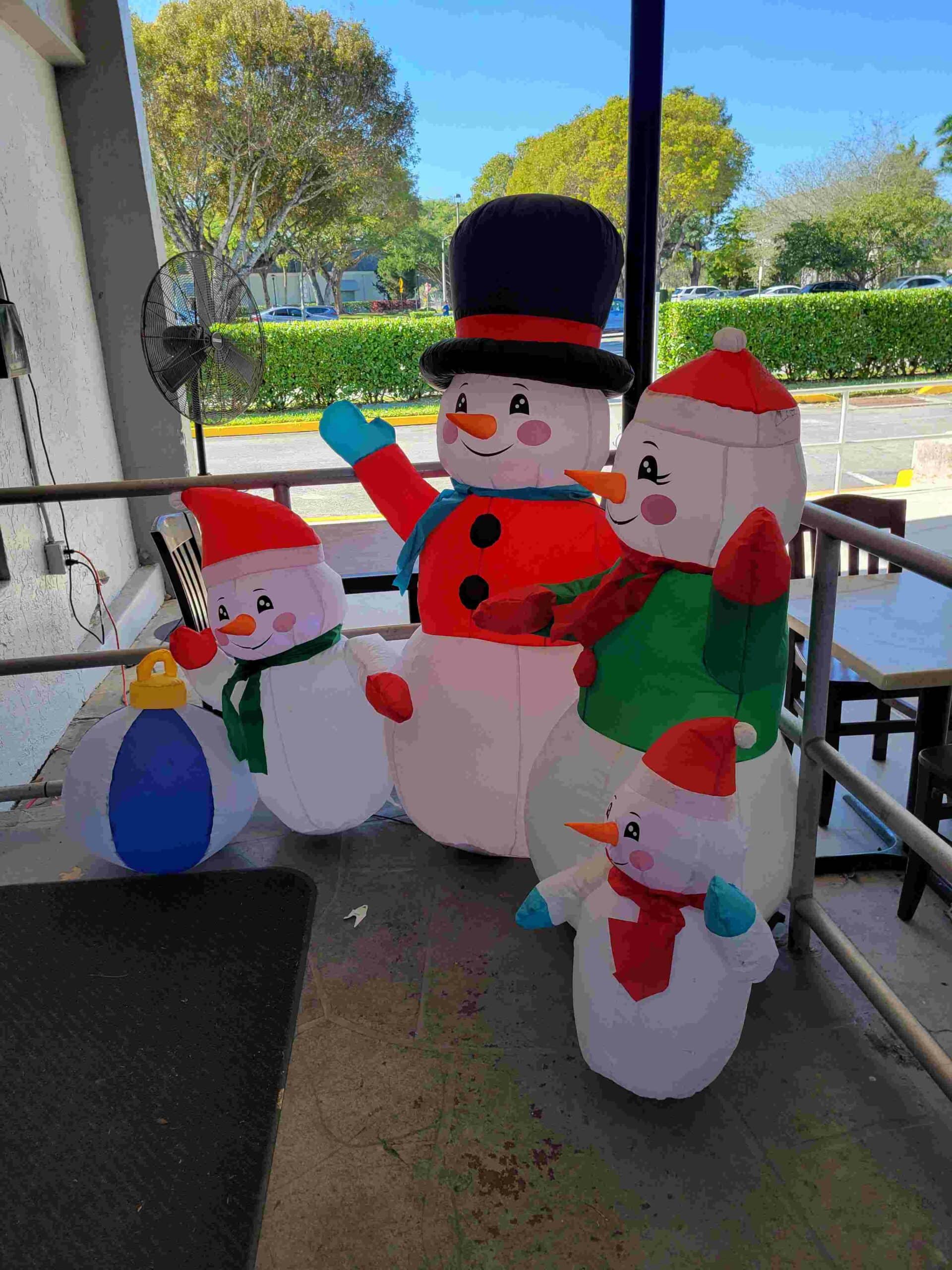 Inflatable snowman family
